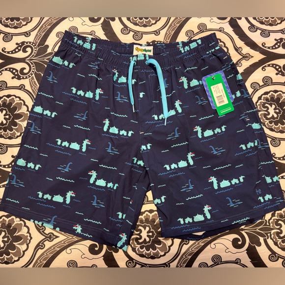 Tipsy Elves Navy Blue Swim Trunks with Aqua Dinosaur Print - Picture 1 of 2